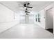 Bright bonus room with two ceiling fans and access to exterior at 117 W Maple St, Davenport, FL 33837