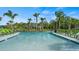 Lazy river pool with lounge chairs and pirate ship at 4839 Kings Castle Cir, Kissimmee, FL 34746