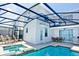Private pool and spa with covered patio and outdoor furniture at 4839 Kings Castle Cir, Kissimmee, FL 34746