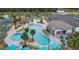 Community pool with large deck and cabana at 4839 Kings Castle Cir, Kissimmee, FL 34746
