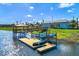 Community boat dock with kayaks and gazebo at 4839 Kings Castle Cir, Kissimmee, FL 34746