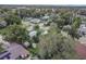 Aerial view showcasing the home and its surroundings at 673 E Church Ave, Longwood, FL 32750