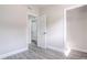 Spacious bedroom with an open door to another room at 673 E Church Ave, Longwood, FL 32750