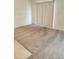 Living room with neutral-colored carpet and sliding glass doors at 114 Mandovi St, Davenport, FL 33837