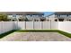 Small backyard with artificial turf and patio at 12456 Turtle Grass Dr, Orlando, FL 32824