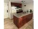 Well-equipped kitchen with granite countertops and ample cabinetry at 6402 Parc Corniche Dr # 5208, Orlando, FL 32821
