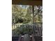 Relaxing balcony view overlooking lush trees and tranquil landscape at 6402 Parc Corniche Dr # 5208, Orlando, FL 32821