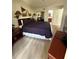 King-size bed, ample floor space, and a view of the bathroom at 6402 Parc Corniche Dr # 5208, Orlando, FL 32821