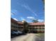 Two-story building with a tiled roof at 6402 Parc Corniche Dr # 5208, Orlando, FL 32821