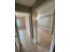 Hallway with tile floors and access to bedrooms at 2416 Swailes Dr # 1, Orlando, FL 32837