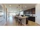 Open concept kitchen with island and stainless steel appliances at 2103 Riley Ave, Eagle Lake, FL 33839