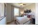 Cozy bedroom with a queen-size bed and neutral decor at 2103 Riley Ave, Eagle Lake, FL 33839
