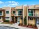 Modern townhouse exterior with stone accents and balcony at 3169 Pantanal Ln, Kissimmee, FL 34747