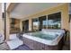 Private hot tub on a patio with seating area at 3169 Pantanal Ln, Kissimmee, FL 34747