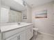 Clean bathroom with white vanity, and neutral color palette at 4743 Magnetite Loop, Mount Dora, FL 32757