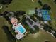 Aerial view of community pool, tennis courts, and basketball court at 4743 Magnetite Loop, Mount Dora, FL 32757