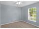 Spacious bedroom with neutral walls and carpeting at 3570 Manor Loop, Lakeland, FL 33810
