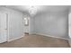 Main bedroom with chandelier, ensuite bathroom access, and walk-in closet at 3570 Manor Loop, Lakeland, FL 33810