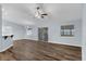 Open living area with wood-look floors and high ceilings at 3570 Manor Loop, Lakeland, FL 33810