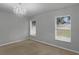 Spacious bedroom with chandelier and carpet at 3570 Manor Loop, Lakeland, FL 33810