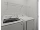 Bright laundry room with Samsung washer and dryer at 5773 High Seas Dr, Orlando, FL 32821