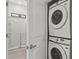 Stackable washer and dryer in a closet at 5773 High Seas Dr, Orlando, FL 32821
