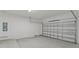 Spacious garage with overhead door and ample storage space at 5773 High Seas Dr, Orlando, FL 32821