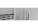 White closet with built-in shelves at 5773 High Seas Dr, Orlando, FL 32821