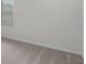 Bright bedroom with neutral carpeting and a large window at 5773 High Seas Dr, Orlando, FL 32821