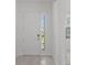 Bright entryway with modern front door at 5773 High Seas Dr, Orlando, FL 32821