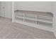Built-in shelving unit with gray countertop at 5773 High Seas Dr, Orlando, FL 32821