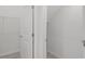 Large walk-in closet with shelving and additional storage area at 5773 High Seas Dr, Orlando, FL 32821