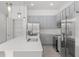 Modern kitchen with stainless steel appliances and island at 5773 High Seas Dr, Orlando, FL 32821
