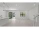 Bright and airy living room with sliding glass doors leading to the backyard at 5773 High Seas Dr, Orlando, FL 32821