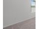 Simple bedroom with gray carpet and window blinds at 5773 High Seas Dr, Orlando, FL 32821
