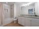 Bathroom with tub, shower, double vanity, and granite countertop at 4683 Terrasonesta Dr, Davenport, FL 33837