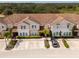 Townhouses with tile roofs and parking at 4683 Terrasonesta Dr, Davenport, FL 33837