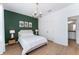 Main bedroom with king-size bed and ensuite bathroom access at 4683 Terrasonesta Dr, Davenport, FL 33837