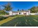Single-Gathering home with a large yard and white siding at 1402 Westminster Way, Kissimmee, FL 34744