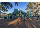 Modern playground with slides, climbing structures, and a safe surface at 1402 Westminster Way, Kissimmee, FL 34744