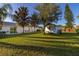 Spacious backyard with shed and mature trees at 1402 Westminster Way, Kissimmee, FL 34744