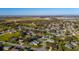 Aerial view of residential neighborhood showing home and surrounding area at 1402 Westminster Way, Kissimmee, FL 34744
