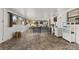 Enclosed Florida room with tiled floor and plenty of light at 1402 Westminster Way, Kissimmee, FL 34744