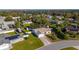 Aerial view of the house and surrounding neighborhood at 1402 Westminster Way, Kissimmee, FL 34744