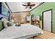 Spacious bedroom with a king-size bed and built-in shelving at 1402 Westminster Way, Kissimmee, FL 34744