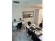 Bright dining area with table, chairs, and a home office space at 3120 Paradox Cir # 102, Kissimmee, FL 34746