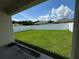 Spacious backyard with grassy lawn and privacy fence at 1648 Heart Bar Rd, Kissimmee, FL 34744