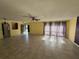 Bright living room featuring tile floors and neutral walls at 1493 Magellan Cir # 504, Orlando, FL 32818