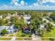 A house among other houses and a lake in the distance at 1015 Ohio Ave, Saint Cloud, FL 34769