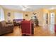 Spacious living room with hardwood floors and brown sofas at 1015 Ohio Ave, Saint Cloud, FL 34769